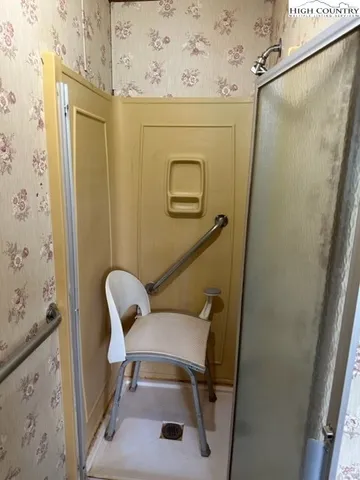 a view of a room with racks on the wall