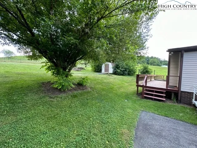 a garden view with a seating space