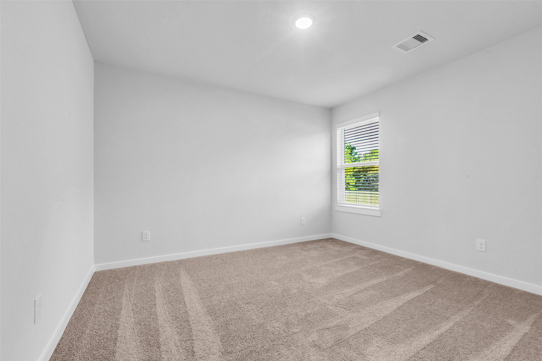 8550 Blueberry Ash Street Magnolia, TX 77354 - Photo 23 of 40 an empty room with windows