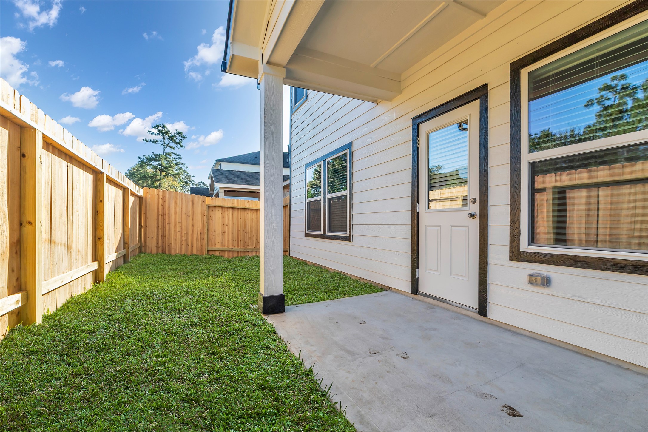8550 Blueberry Ash Street Magnolia, TX 77354 - Photo 37 of 40 a view of a house with backyard and garden
