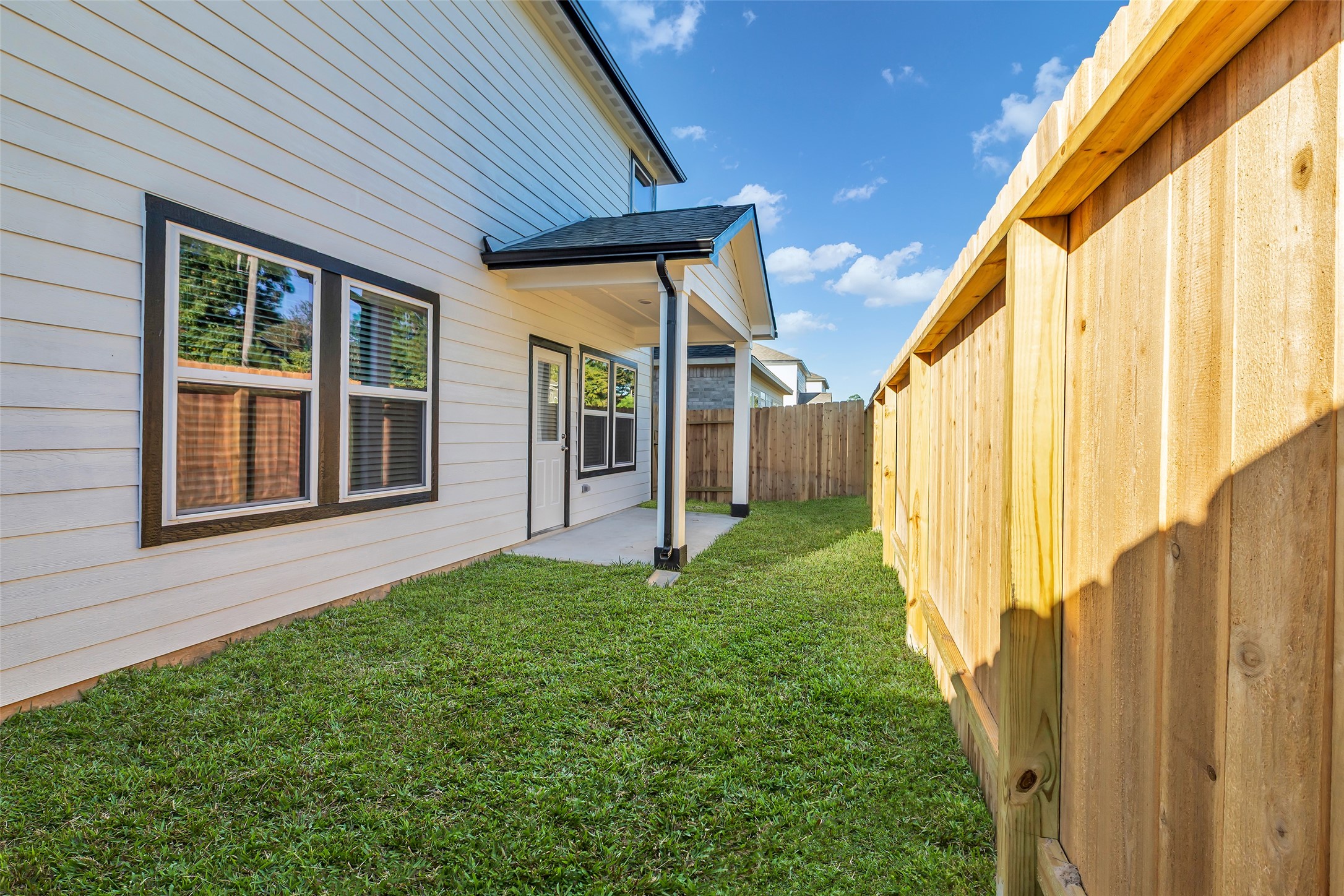 8550 Blueberry Ash Street Magnolia, TX 77354 - Photo 40 of 40 a view of house with backyard and porch