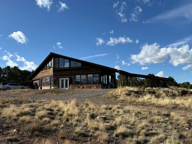 a view of house with outdoor space and street view