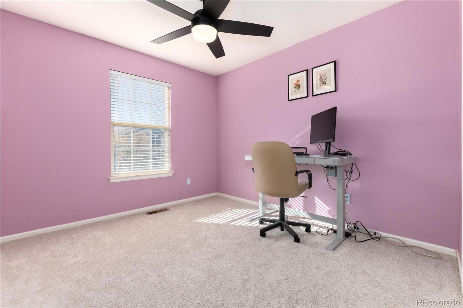 9867 Aftonwood Street Highlands Ranch, CO 80126 - Photo 20 of 41 a view of a workspace with furniture and a window