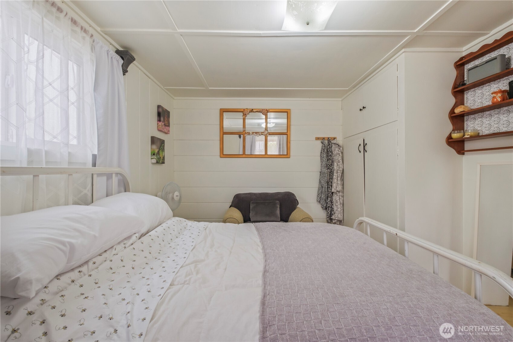 4 Memory Lane Copalis Beach, WA 98535 - Photo 14 of 29 a bedroom with a bed and a window