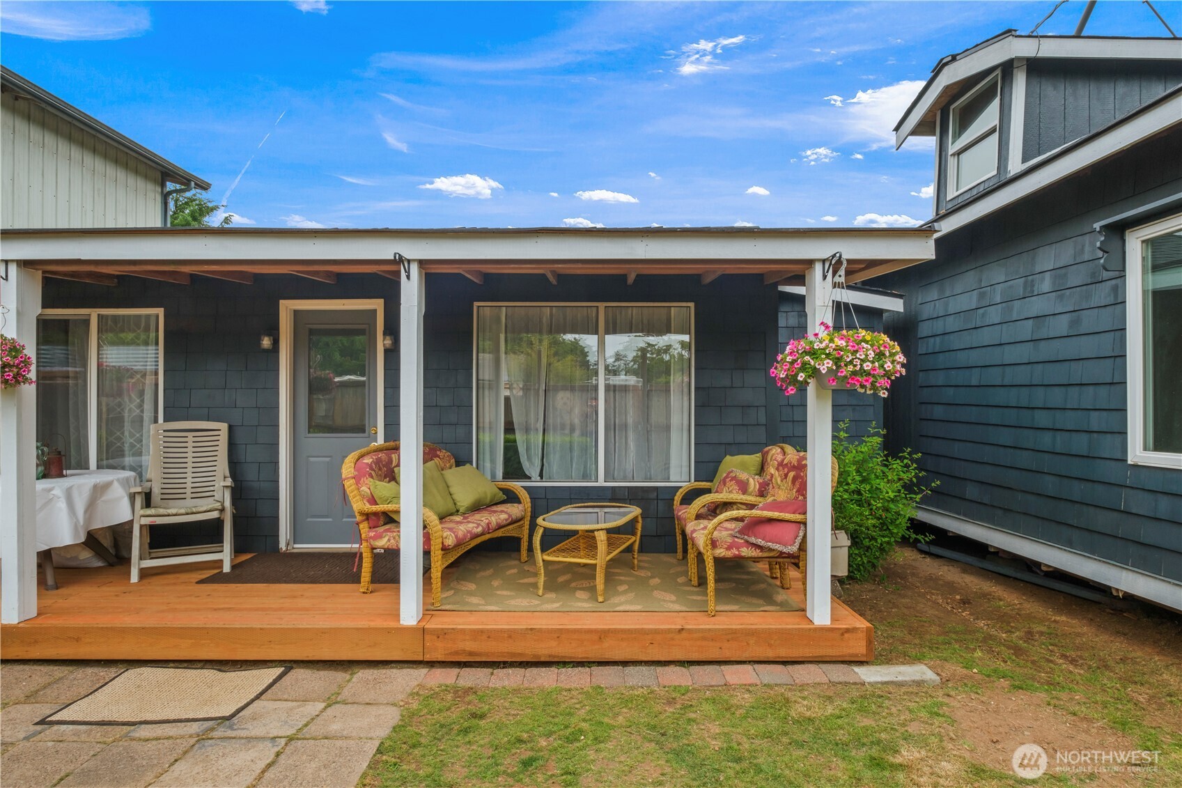 4 Memory Lane Copalis Beach, WA 98535 - Photo 3 of 29 a patio with table and chairs