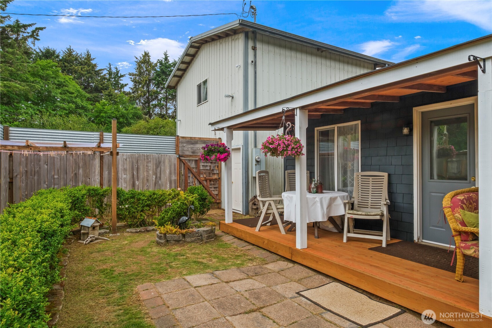4 Memory Lane Copalis Beach, WA 98535 - Photo 7 of 29 a patio with table and chairs