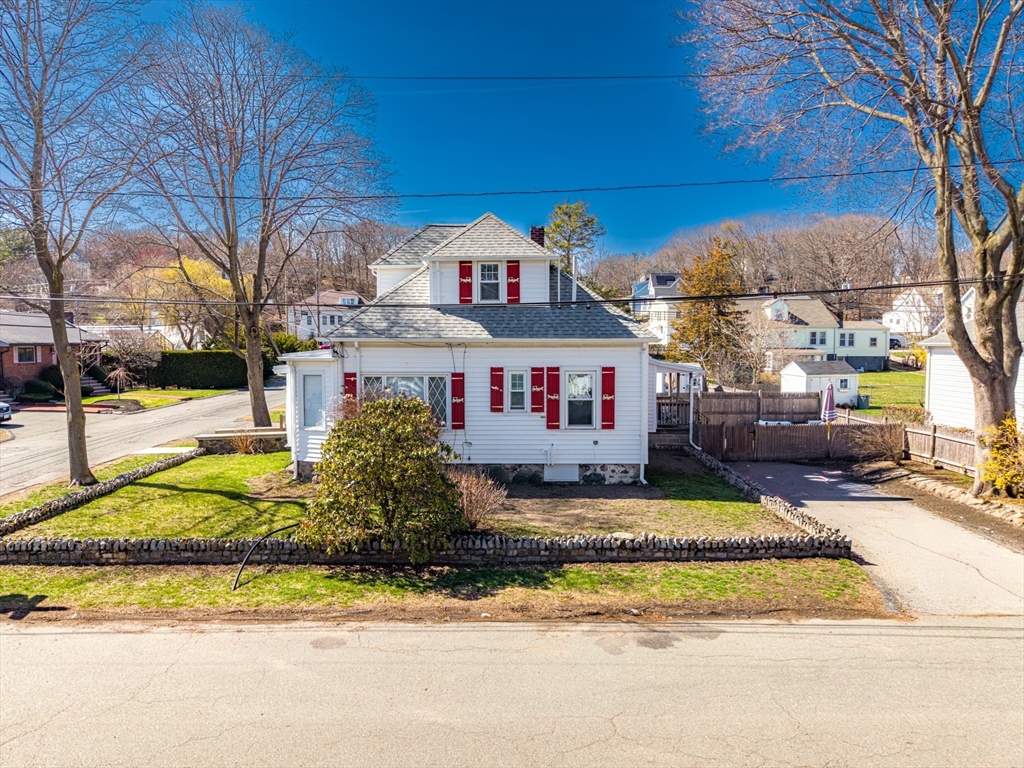 10 Guild Road Saugus, MA 01906 - Photo 3 of 32 a front view of a house with a yard