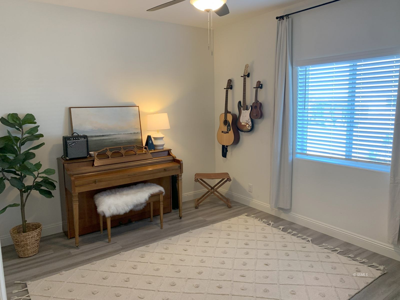 419 Thomas Street Ridgecrest, CA 93555 - Photo 26 of 32 a bedroom with furniture and a window