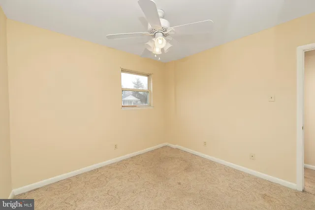 a view of a storage & utility room with a sink