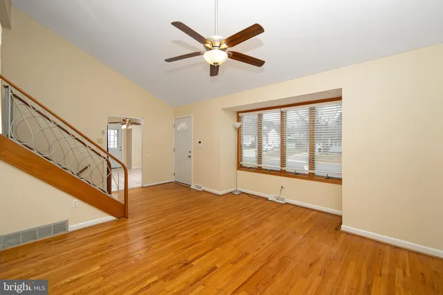a kitchen with stainless steel appliances granite countertop a stove sink and cabinets