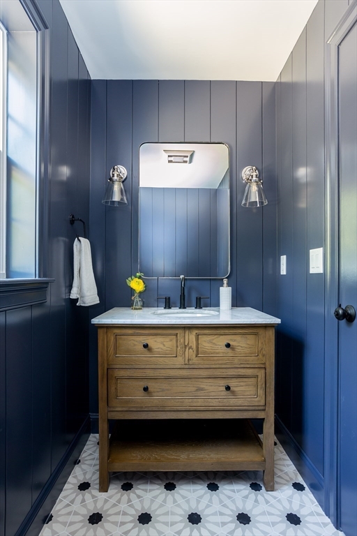 65 Great Neck Road Wareham, MA 02571 - Photo 19 of 41 a bathroom with a sink and a mirror
