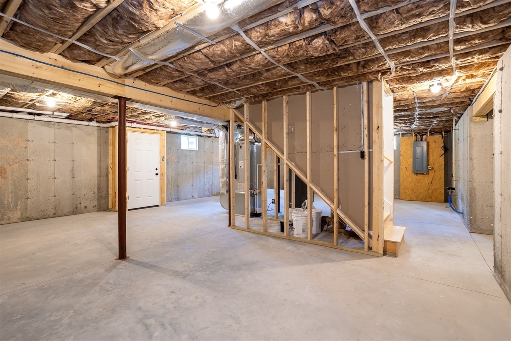 65 Great Neck Road Wareham, MA 02571 - Photo 40 of 41 a view of an empty room with stairs