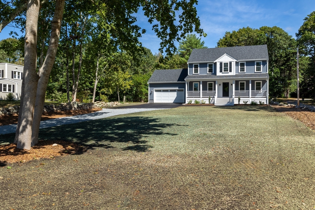 65 Great Neck Road Wareham, MA 02571 - Photo 4 of 41 front view of a house with a yard