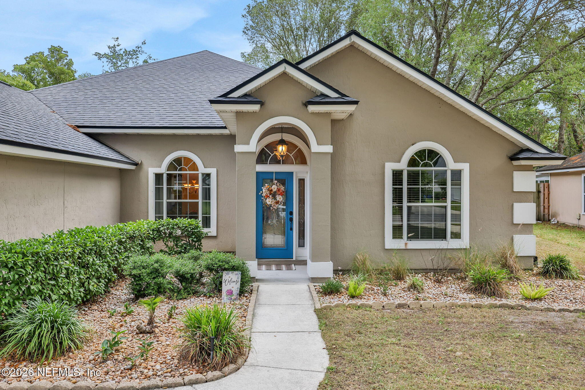 4320 Rye Court St. Johns, FL 32259 - Photo 3 of 60 a front view of a house with garden