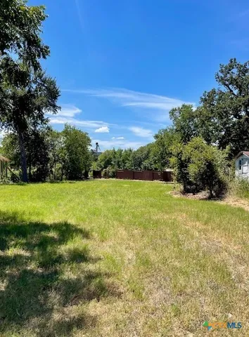 a view of building with yard