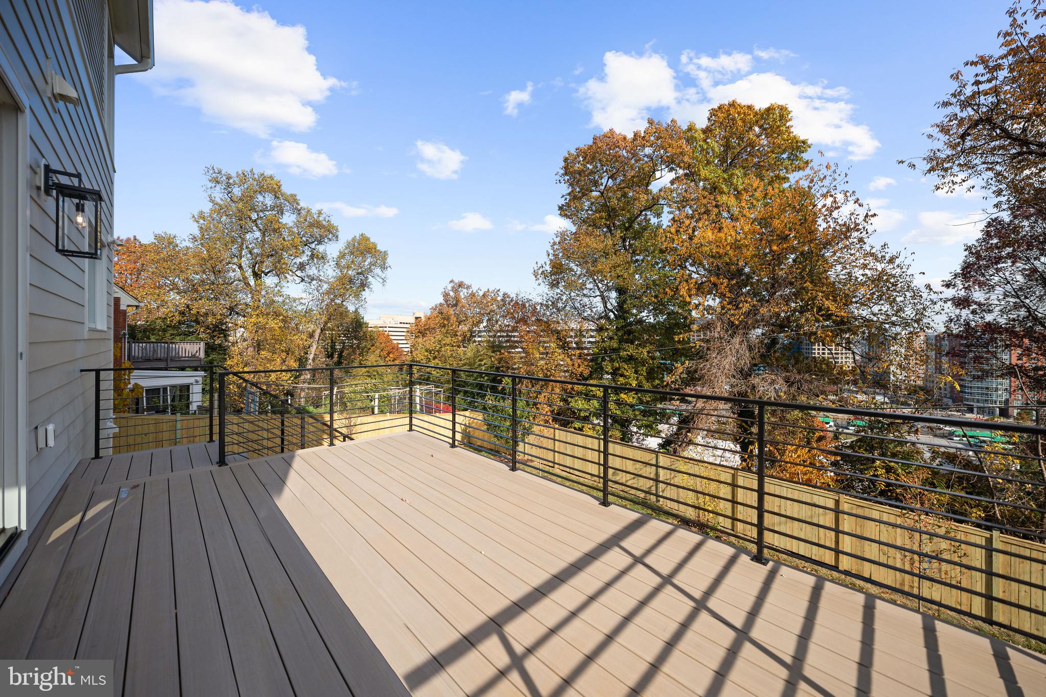 600 29th Road South Arlington, VA 22202 - Photo 13 of 62 a view of balcony with wooden floor and fence