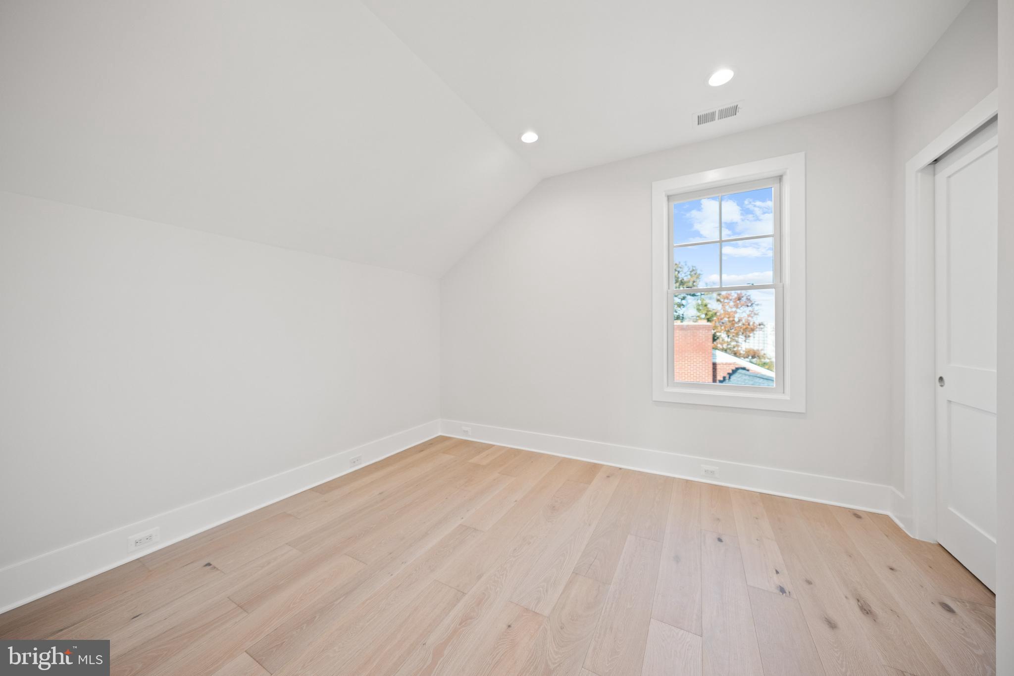 600 29th Road South Arlington, VA 22202 - Photo 35 of 62 an empty room with wooden floor and windows