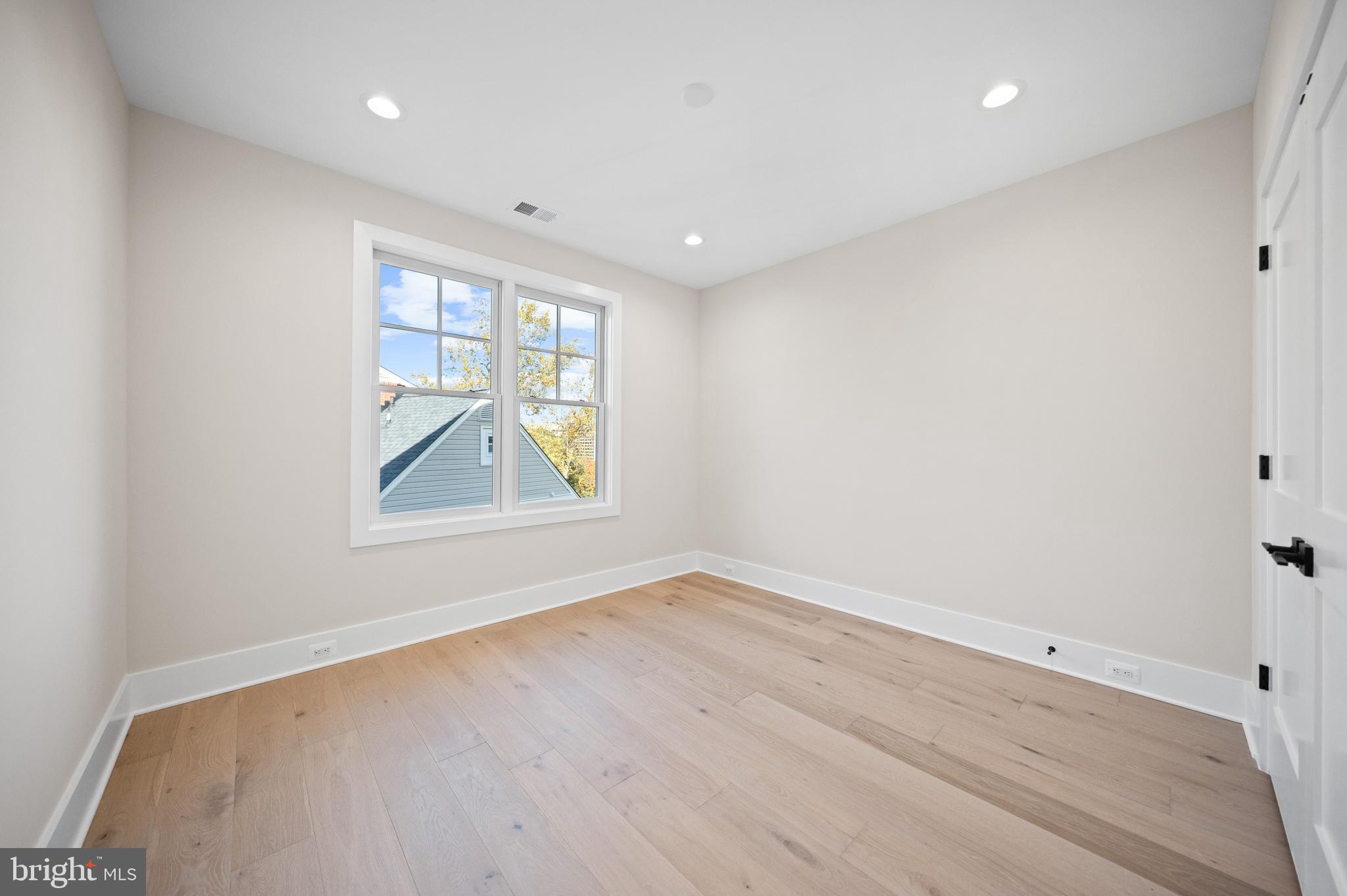 600 29th Road South Arlington, VA 22202 - Photo 47 of 62 wooden floor in an empty room with a window