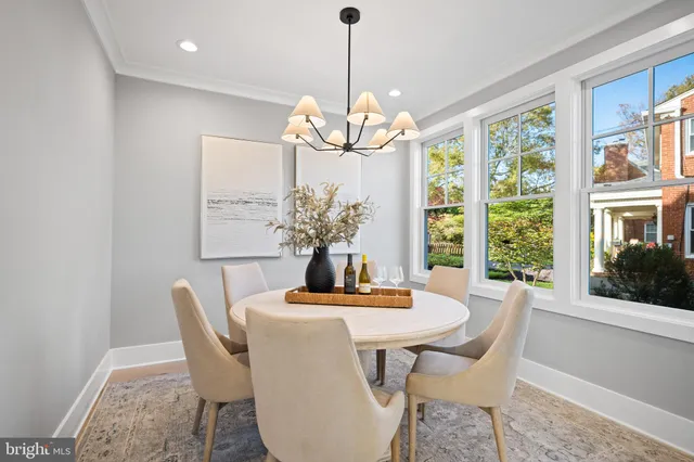 a bathroom with a double vanity sink mirror and