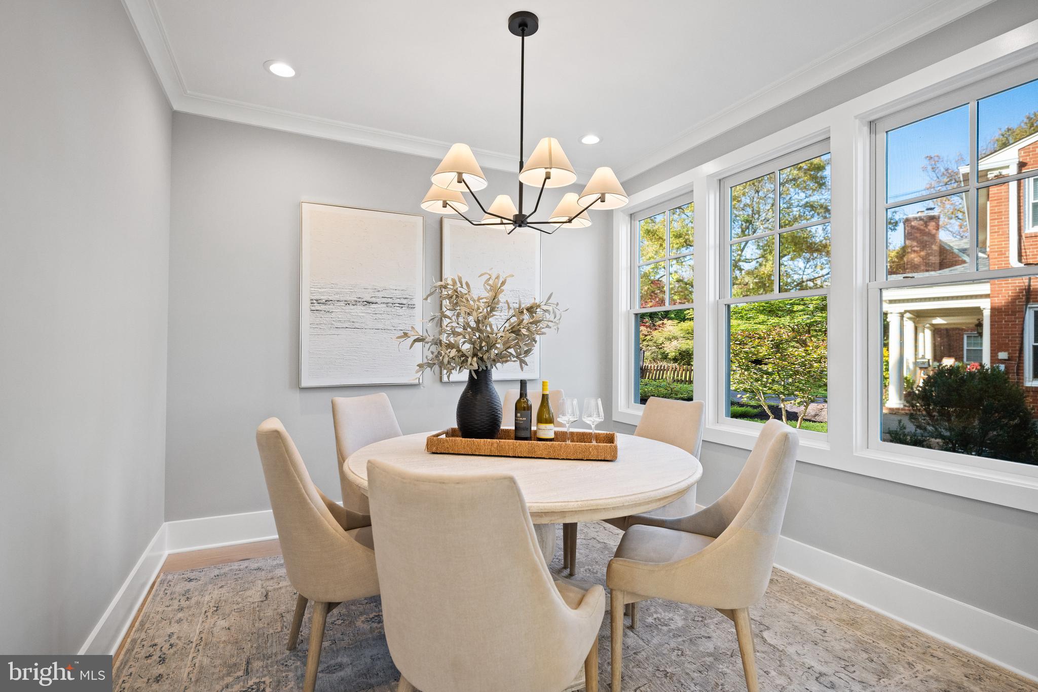 600 29th Road South Arlington, VA 22202 - Photo 10 of 62 a dining room with furniture a large window and a chandelier