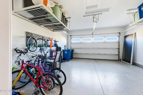 a living room with furniture a couch and a window