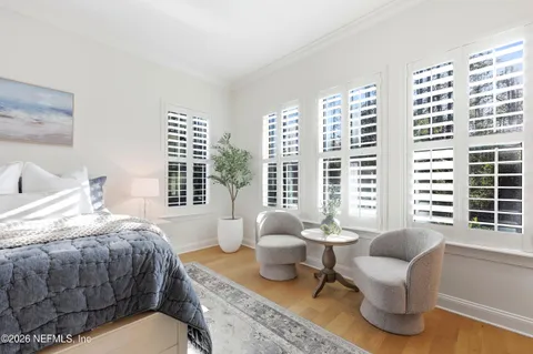 a bathroom with a sink vanity toilet and a mirror