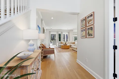 a living room with fireplace furniture and a flat screen tv
