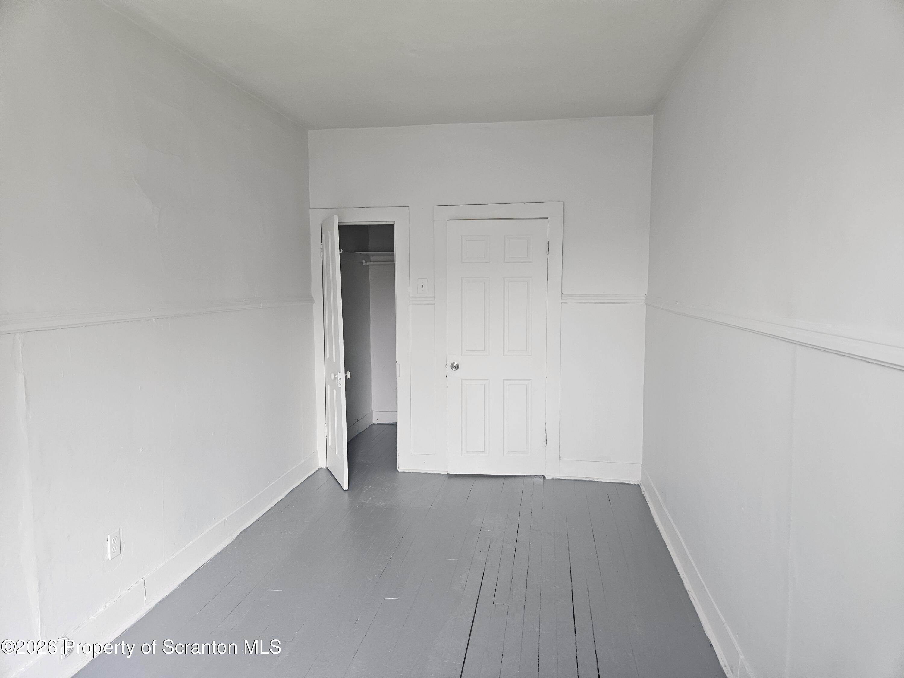 715 Moosic Street, Unit 5 Scranton, PA 18505 - Photo 12 of 14 a view of a room with wooden floor