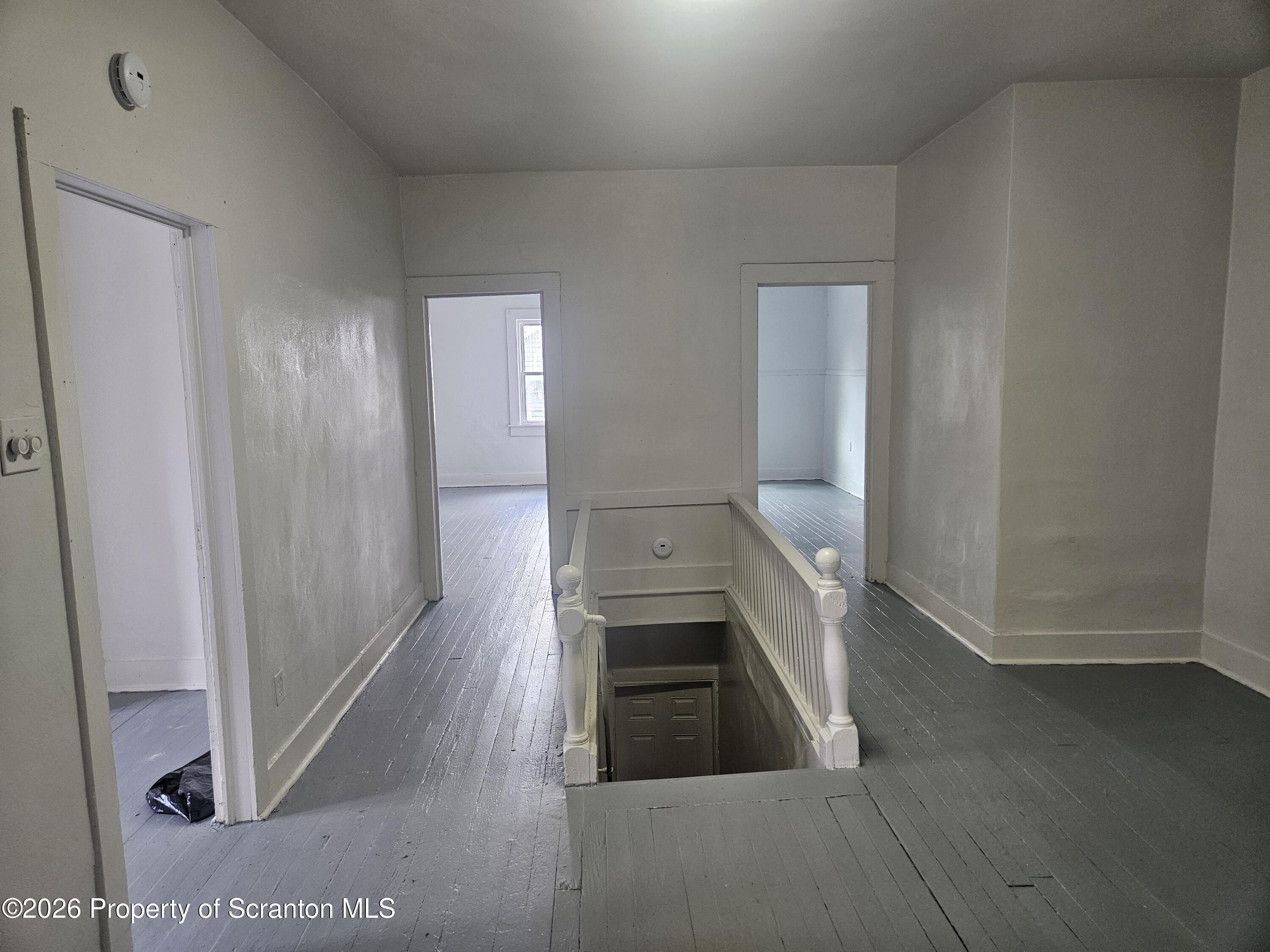 715 Moosic Street, Unit 5 Scranton, PA 18505 - Photo 7 of 14 a view of a kitchen from a hallway