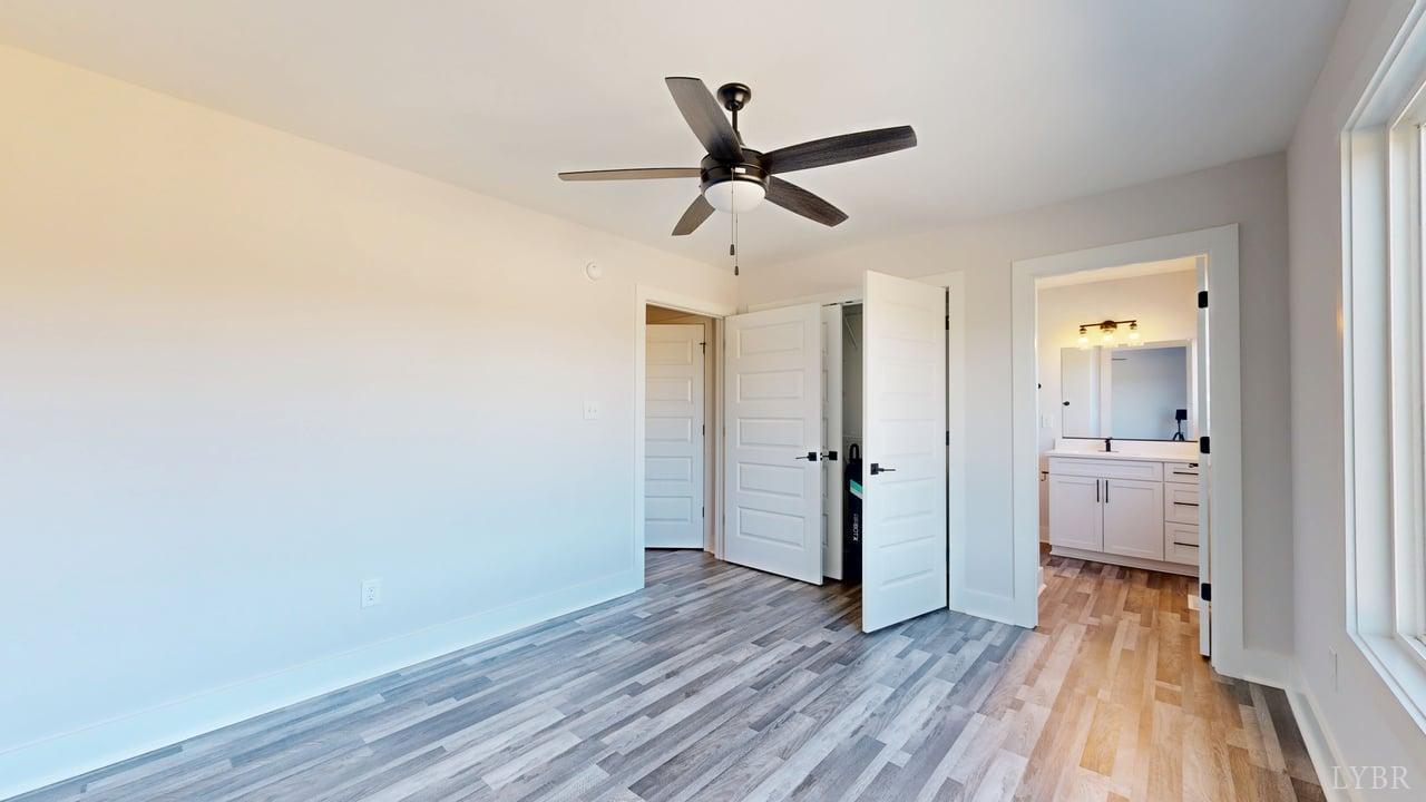 128 Allure Drive Rustburg, VA 24588 - Photo 16 of 30 a view of a hallway with wooden floor