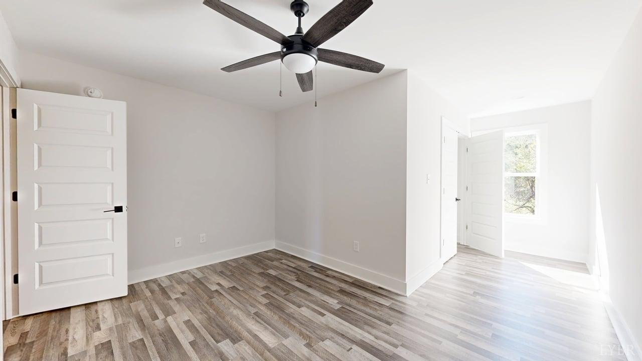 128 Allure Drive Rustburg, VA 24588 - Photo 18 of 30 wooden floor in an empty room