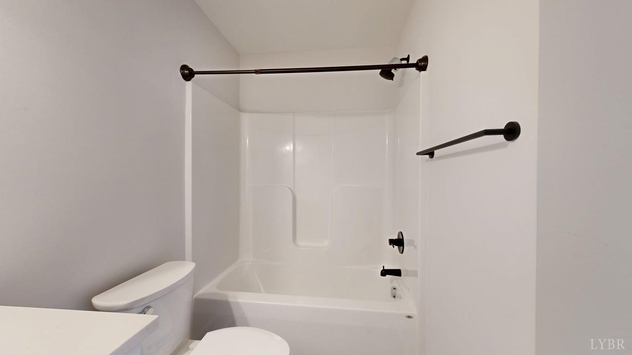 128 Allure Drive Rustburg, VA 24588 - Photo 19 of 30 a bathroom with a shower and toilet