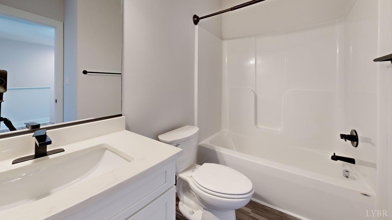 128 Allure Drive Rustburg, VA 24588 - Photo 24 of 30 a bathroom with a sink toilet and shower