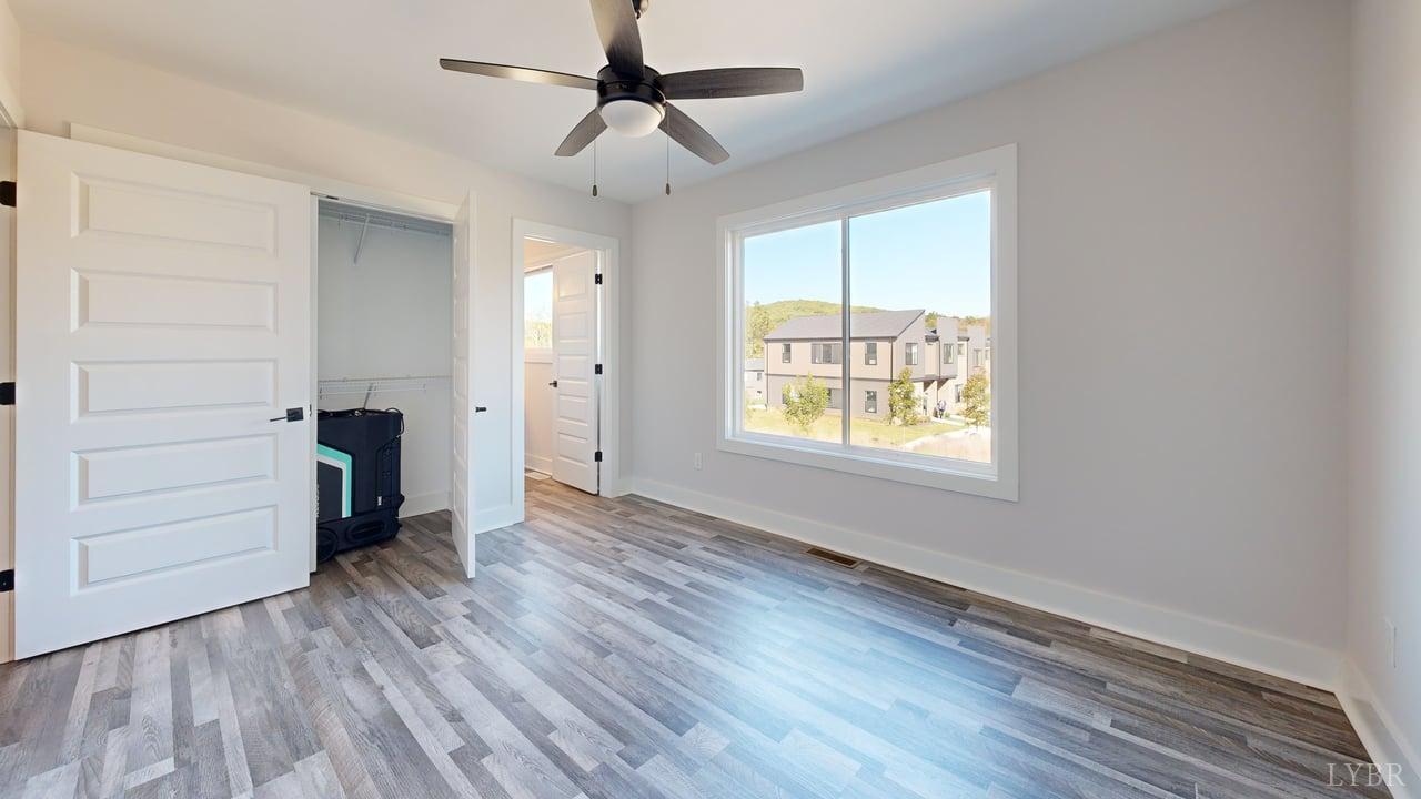 128 Allure Drive Rustburg, VA 24588 - Photo 26 of 30 wooden floor in an empty room with a window