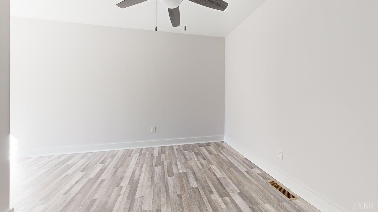 128 Allure Drive Rustburg, VA 24588 - Photo 29 of 30 a view of a room with wooden floor