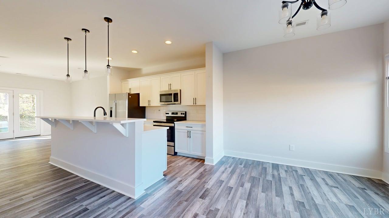 128 Allure Drive Rustburg, VA 24588 - Photo 3 of 30 a view of kitchen with cabinets and wooden floor