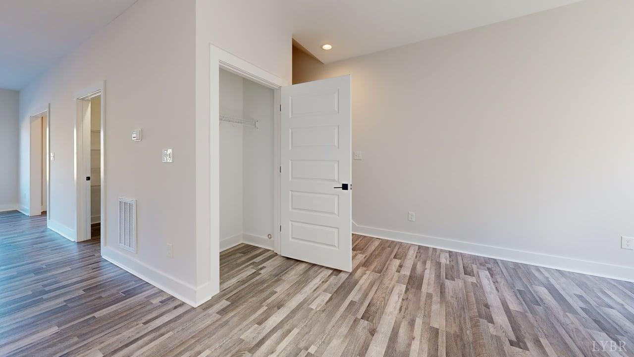 128 Allure Drive Rustburg, VA 24588 - Photo 8 of 30 wooden floor in an empty room