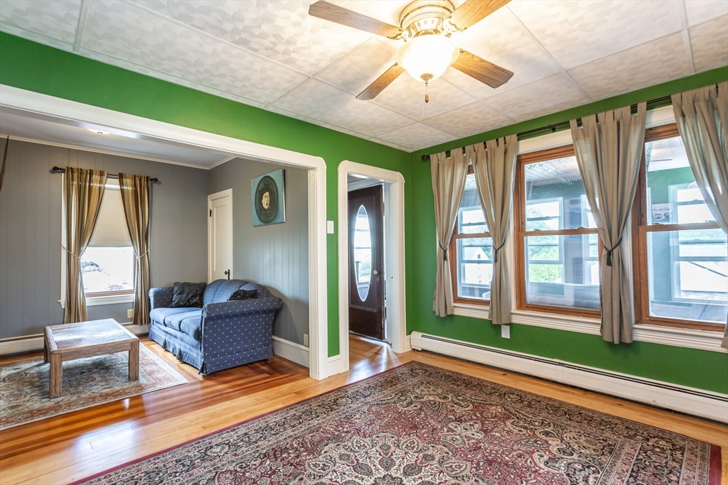 123 Huard Street Fall River, MA 02721 - Photo 12 of 26 a living room with furniture and a large window