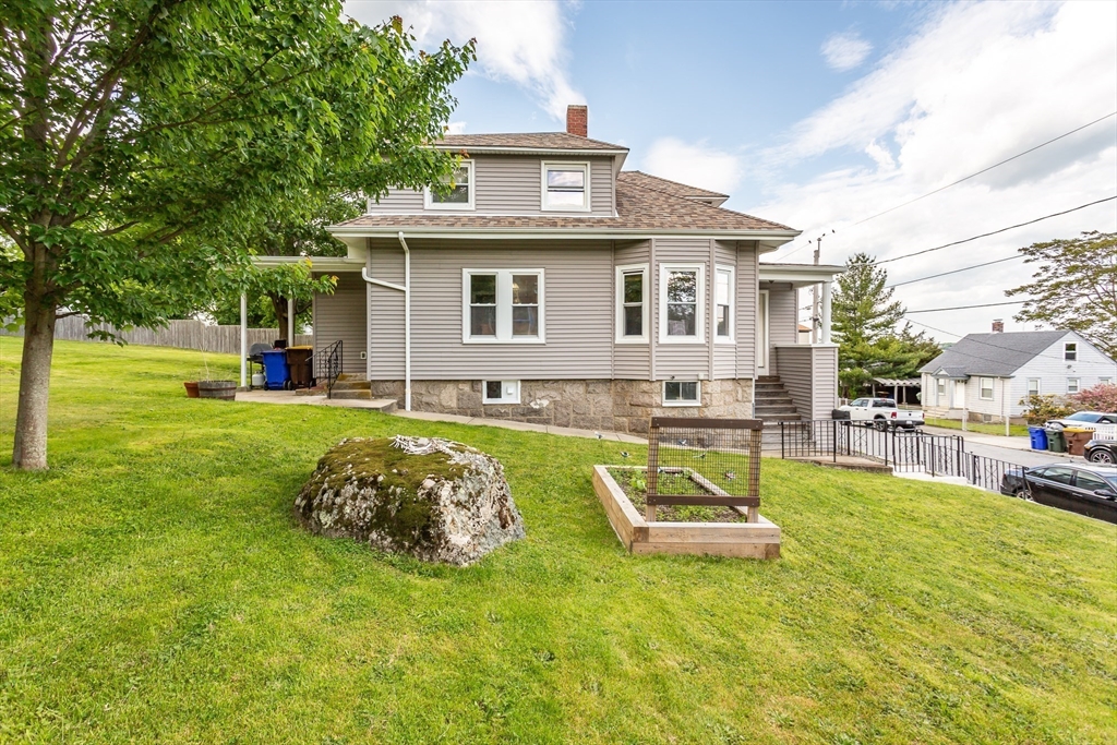 123 Huard Street Fall River, MA 02721 - Photo 5 of 26 a view of a house with a swimming pool