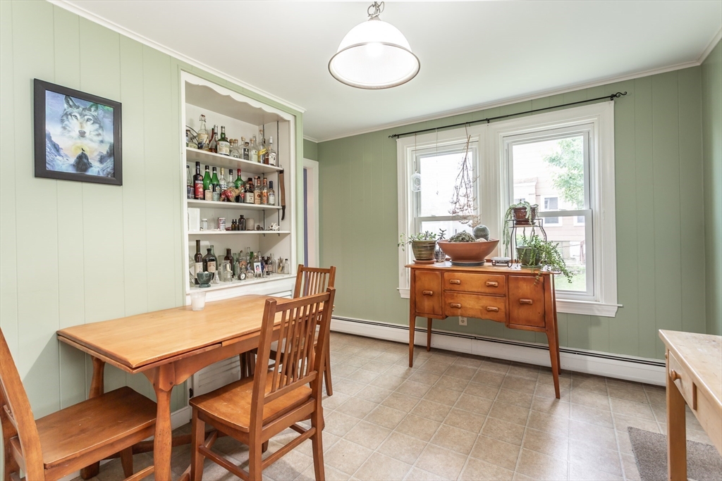 123 Huard Street Fall River, MA 02721 - Photo 6 of 26 a view of a room with furniture and windows