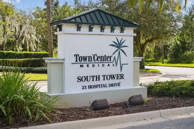 a view of a swimming pool with a garden