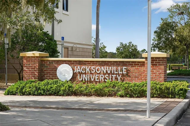 a view of a sign on the side of the road