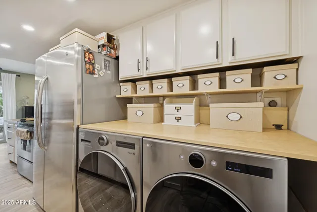 a utility room with dryer and washer