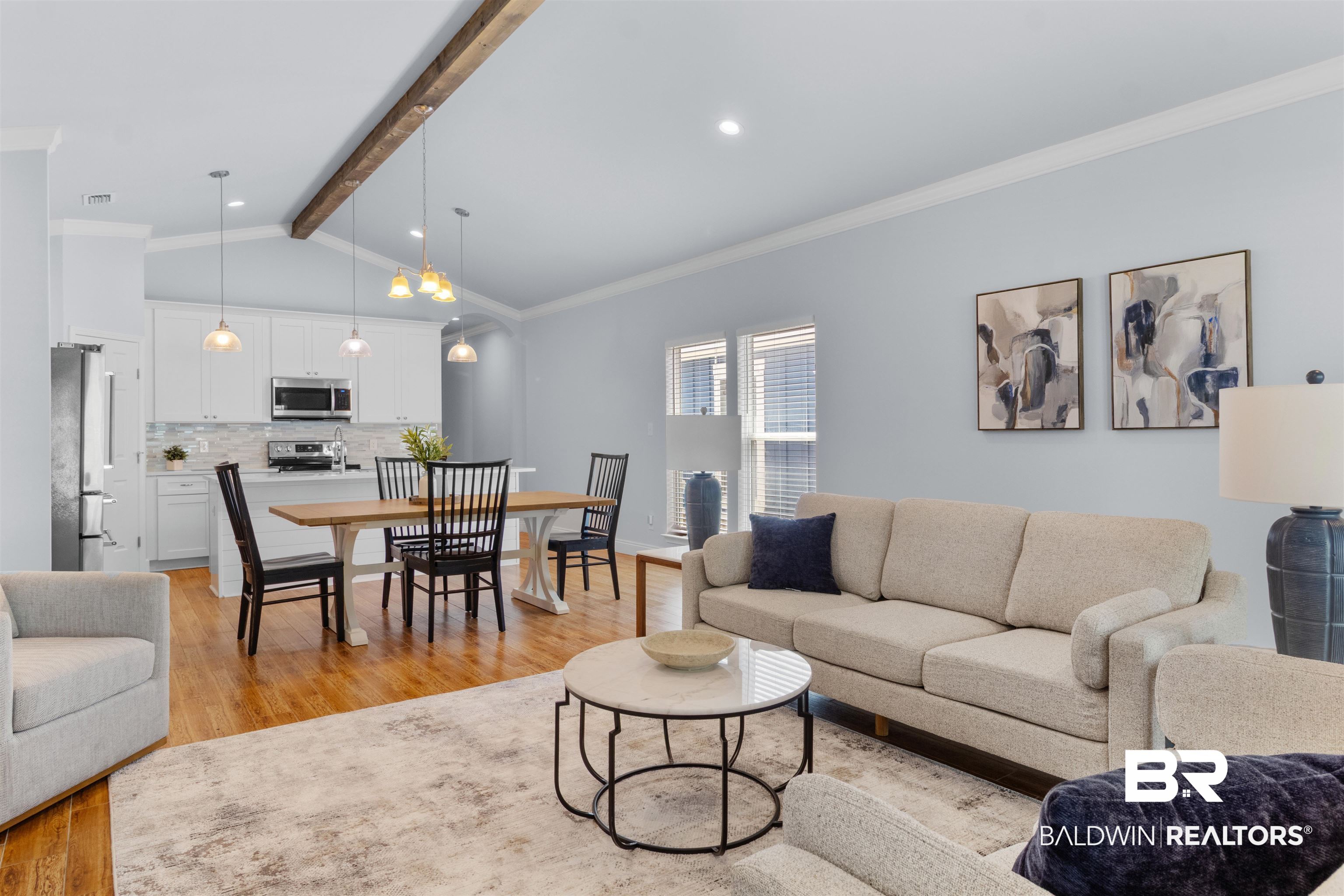 927 Periwinkle Lane Foley, AL 36535 - Photo 4 of 26 Open-concept living space featuring wood-finish flooring, a vaulted ceiling with a decorative beam, and recessed lighting