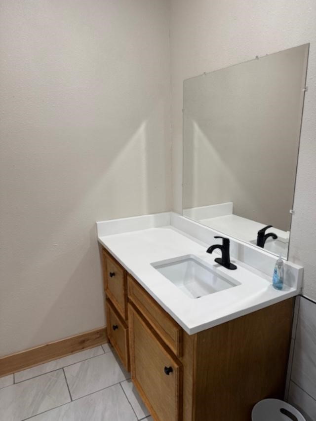 9500 Bissell Road Manvel, TX 77578 - Photo 12 of 14 a utility room with sink and mirror