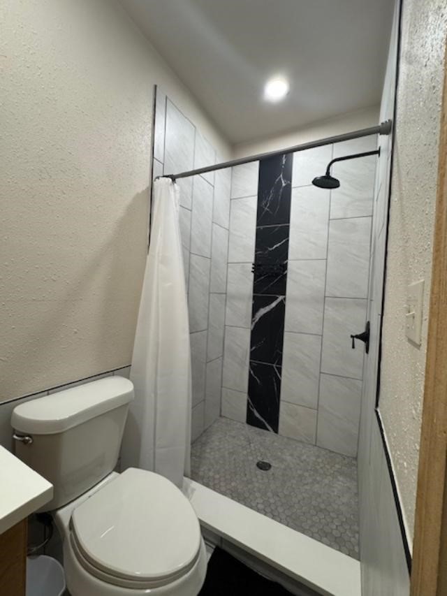 9500 Bissell Road Manvel, TX 77578 - Photo 6 of 14 a bathroom with a shower and toilet