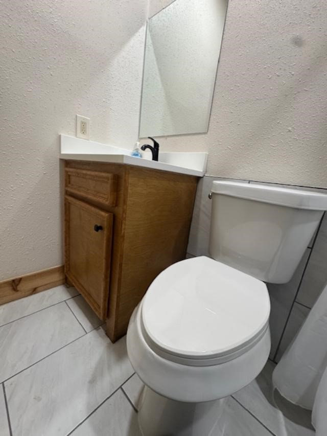 9500 Bissell Road Manvel, TX 77578 - Photo 7 of 14 a bathroom with a toilet and a sink