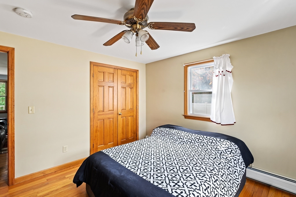 1 Plain Street Easthampton, MA 01027 - Photo 16 of 41 a bedroom with a bed and a window