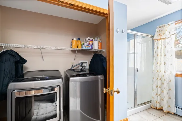 a utility room with dryer and washer