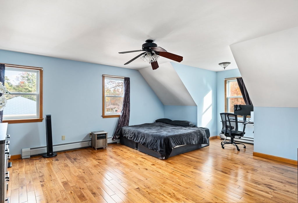 1 Plain Street Easthampton, MA 01027 - Photo 23 of 41 a living room with furniture and wooden floor